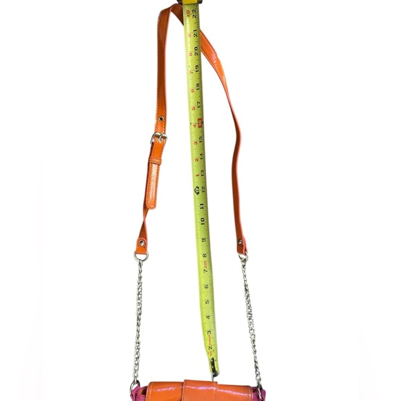Nine West Coral
Pebbled Leather ILike
Handbag Swing Pack
Adjustable Strap - Picture 14 of 14